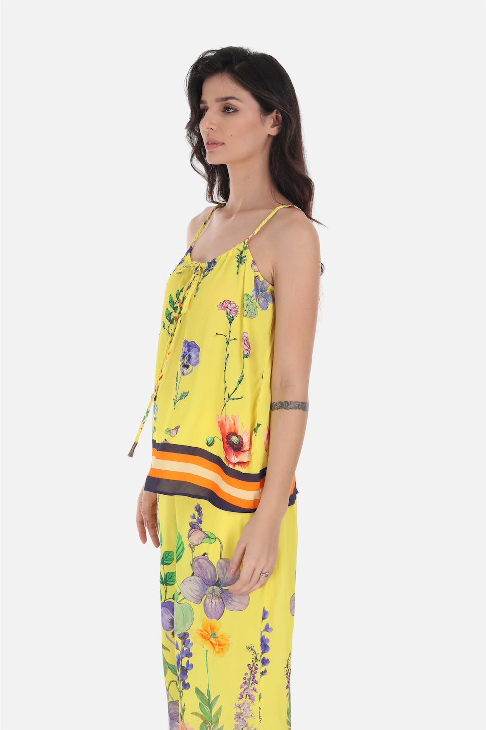 Side view of the yellow, green and black Calico Cami Top  (TheSwankStore) Viscose Crepe fabric