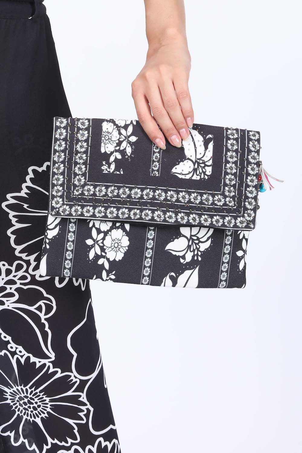 Front view of the black and white AVANTI - CLUTCH BAG Canvas fabric