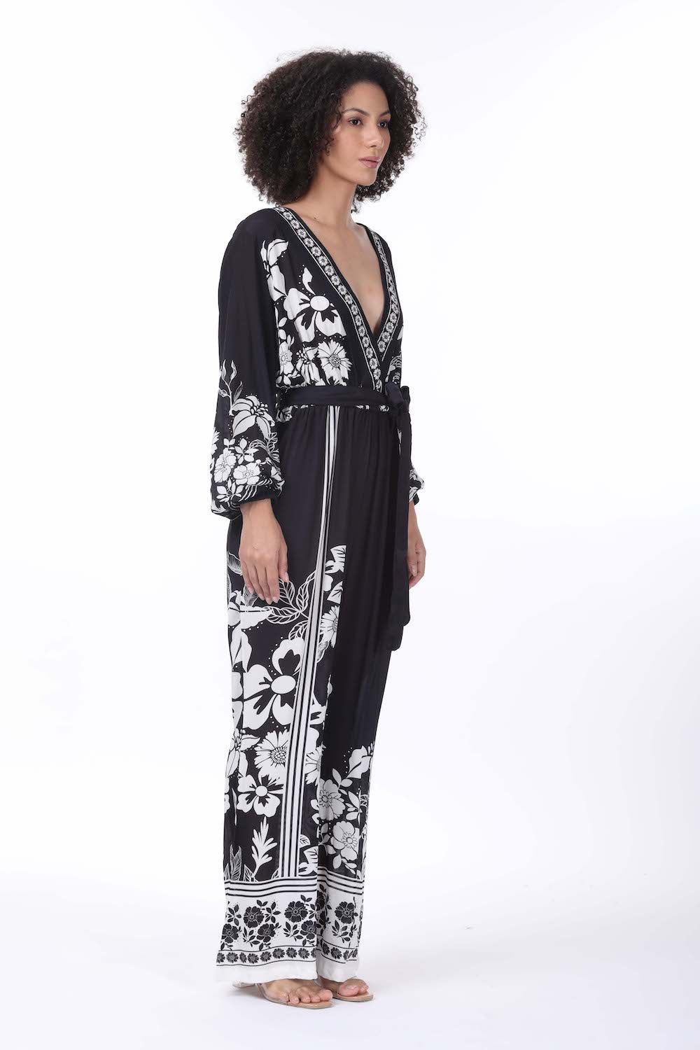 Side view of the black and white Avanti Luxe Jumpsuit (TheSwankStore) Viscose fabric