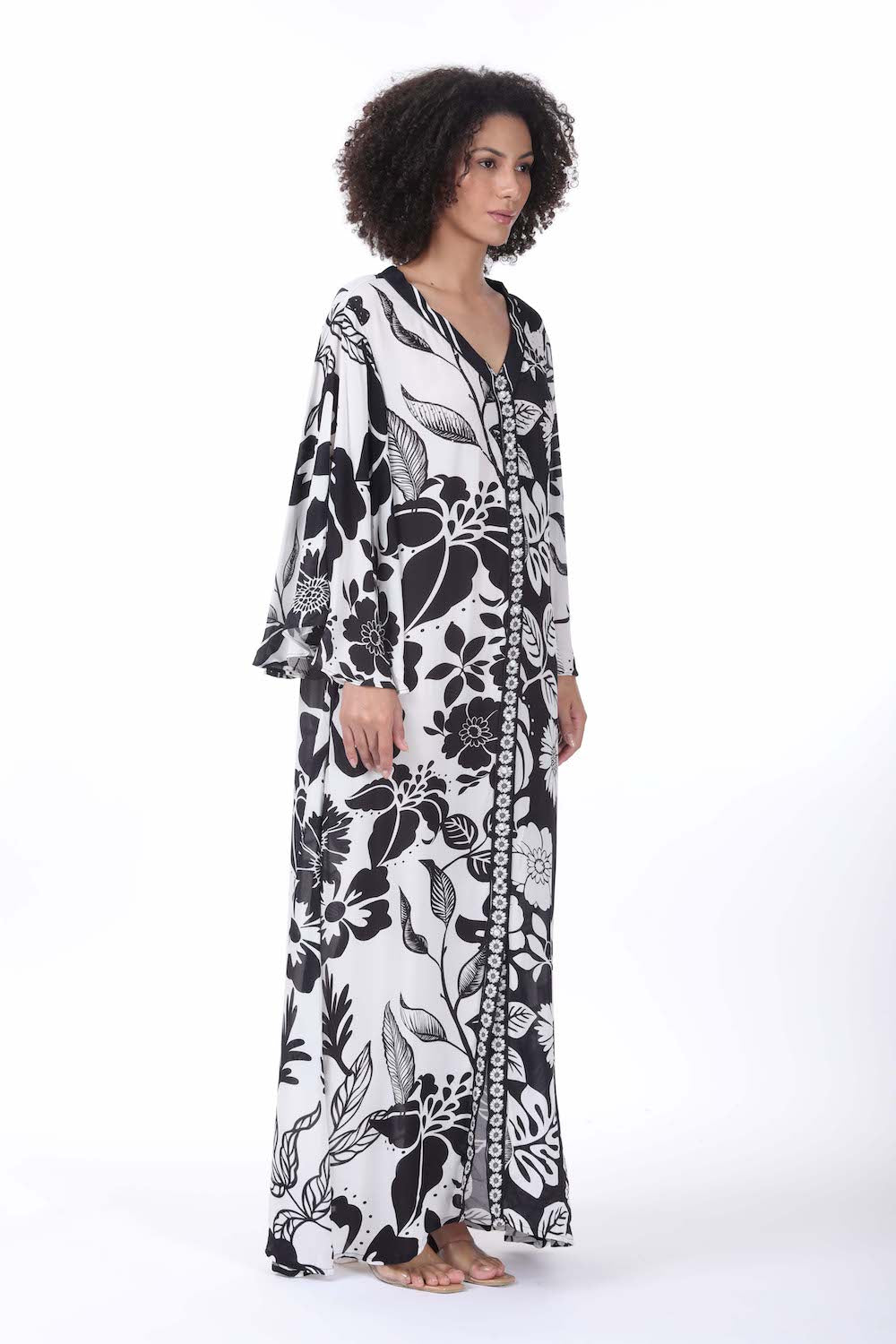 Side view of the black and white Avanti Maxi Sun Dress (TheSwankStore) Viscose Crepe fabric