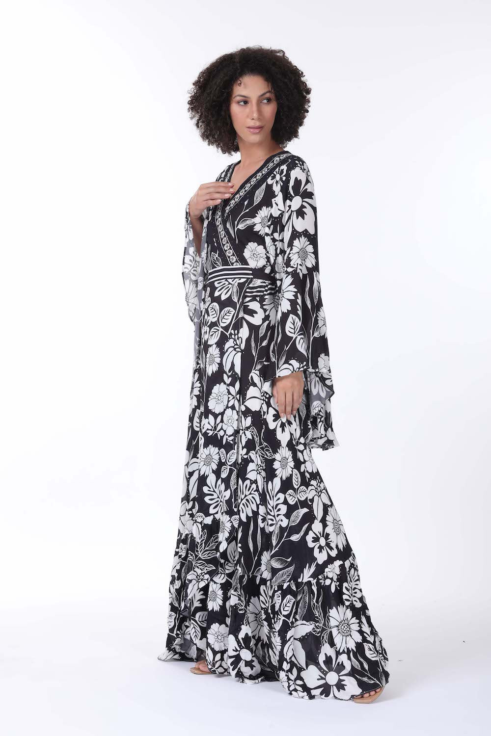 Side look of the black and white AVANTI - DAISY DRESS Modern design with Viscose fabric