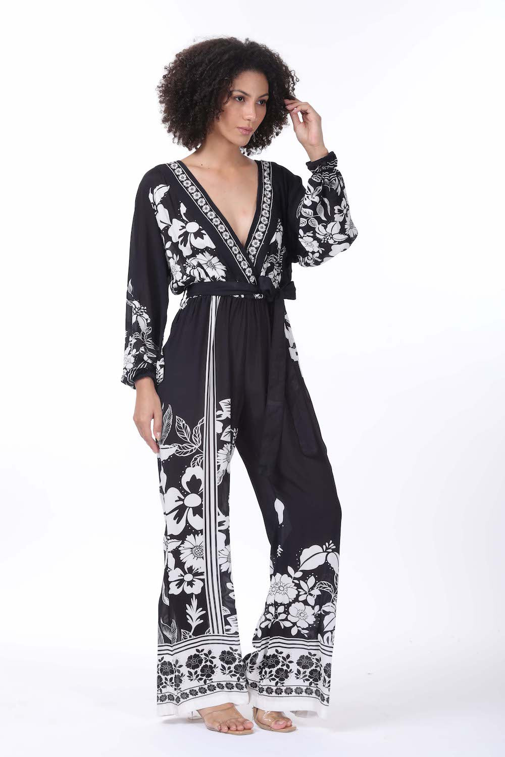 Side view of the black and white Avanti Luxe Jumpsuit (TheSwankStore) Viscose fabric