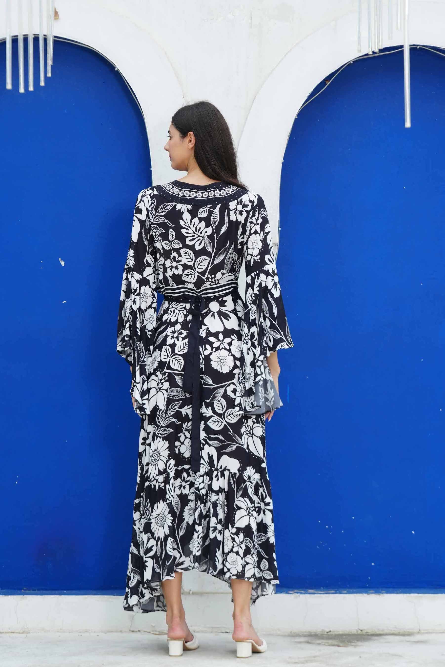 Back view of the black and white AVANTI - DAISY DRESS Modern design with Viscose fabric
