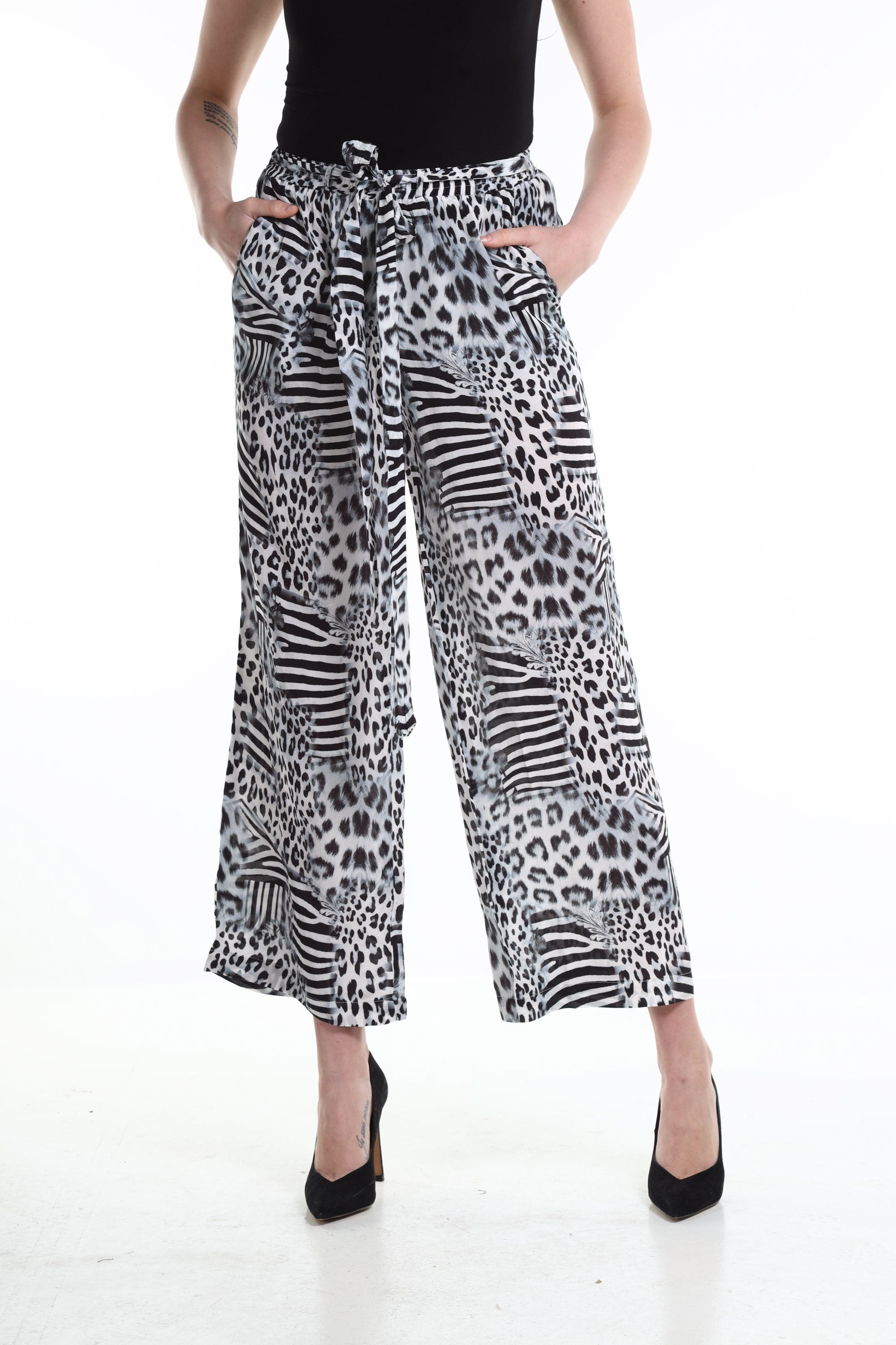 Front view of the Black, White & Orange Zaffari Pants (TheSwankStore) Soft Viscose fabric