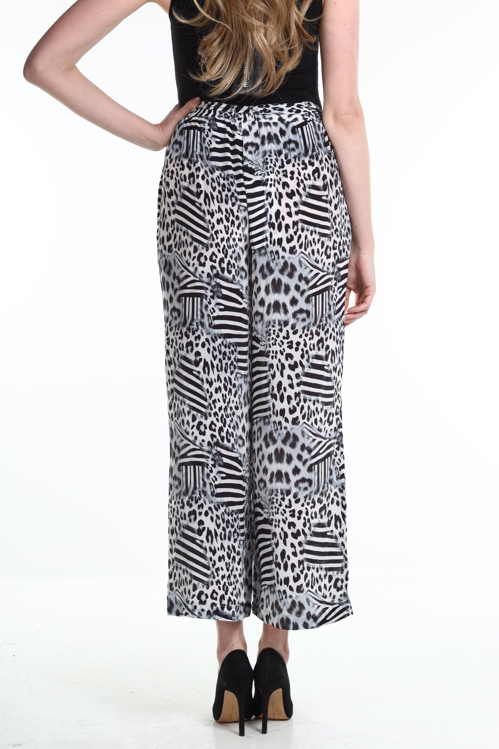 Back view of the Black, White & Orange Zaffari Pants (TheSwankStore) Soft Viscose fabric