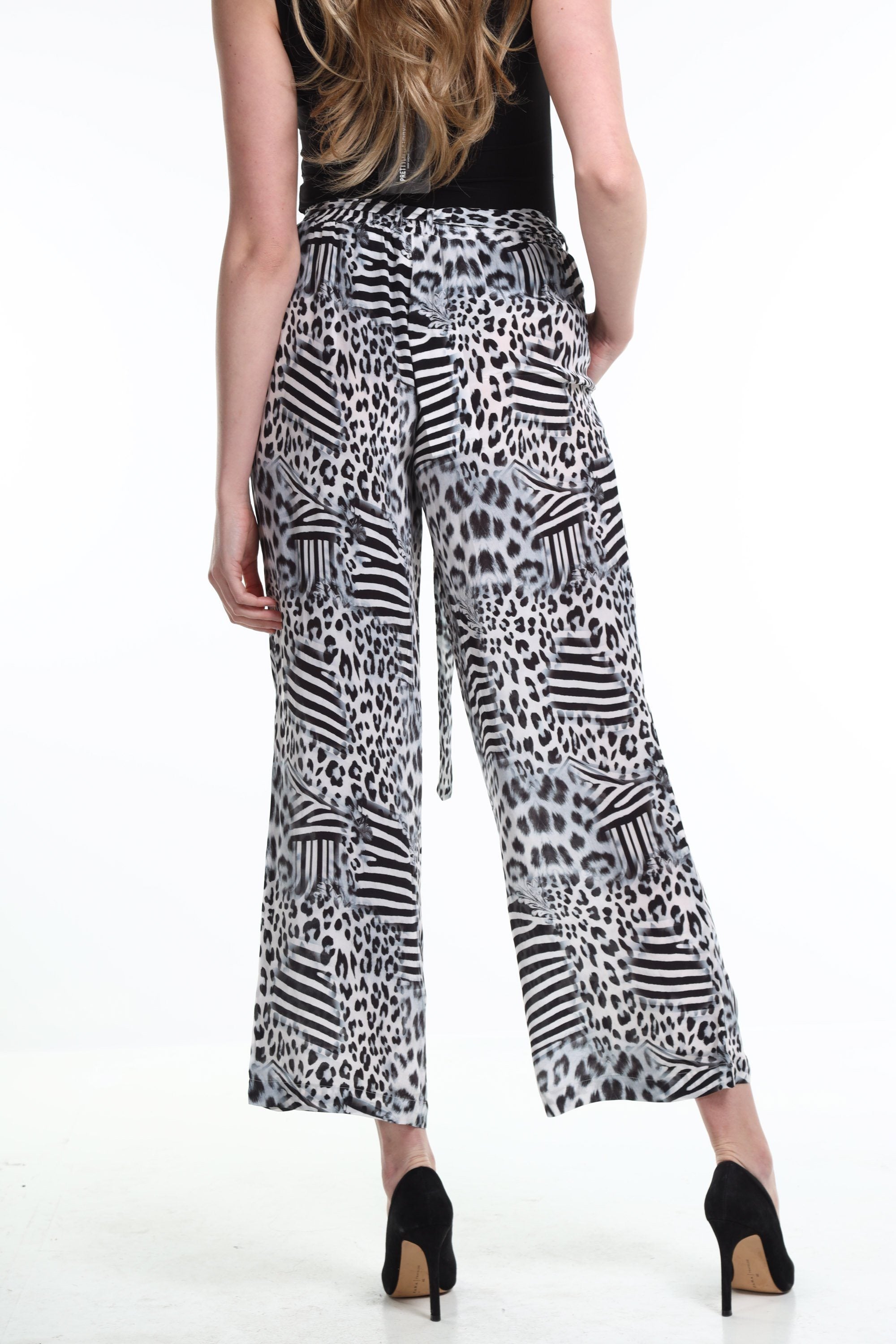 Back view of the Black, White & Orange Zaffari Pants (TheSwankStore) Soft Viscose fabric